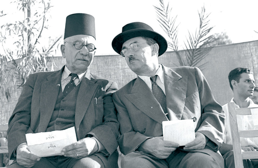 FORMER PRIME minister Moshe Sharett (right) and Israeli-Arab MK Amin-Salim Jarjora. (credit: Wikimedia Commons)