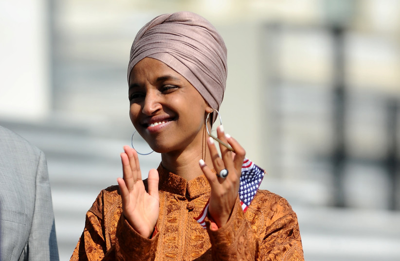 Rep. Ilhan Omar (D-MN) attends a press event on the first 200 days of the 116th Congress at the U.S. Capitol in Washington, U.S., July 25, 2019 (photo credit: MARY F. CALVERT / REUTERS)