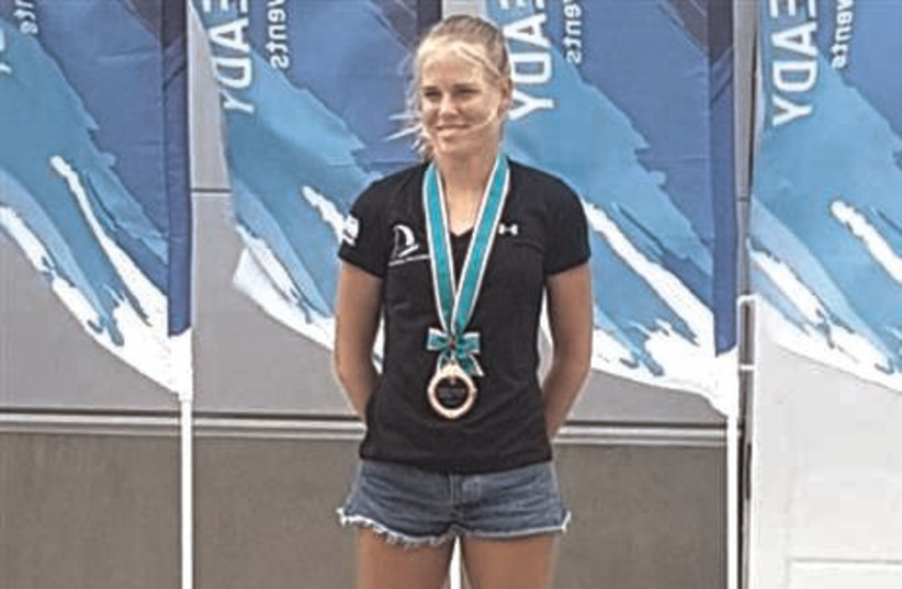 ISRAELI WINDSURFER Katy Spychakov improved her chances of qualifying for the RS:X competition at the 2020 Tokyo Olympics with a bronze medal yesterday at the Ready Steady Tokyo – Sailing competition in Japan. (photo credit: ISRAELI SAILING ASSOCIATION/COURTESY)