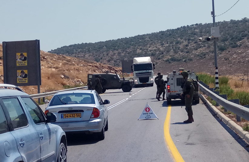 IDF roadblocks placed as forces scan the area to find the Ein Bubin terrorist (photo credit: ADIEL STERN/TPS)