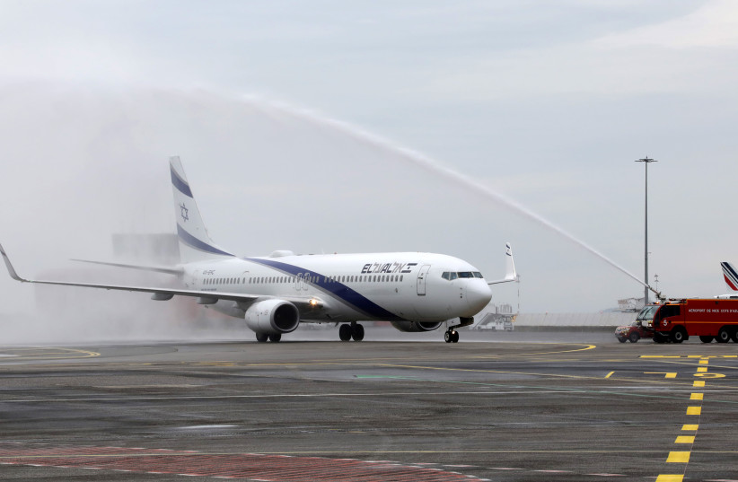 An Israel El Al Airlines plane is welcomed by jets of water during the inauguration of the company's flight route between Tel Aviv and Nice, at Nice international airport, France, April 4, 2019. (photo credit: REUTERS/ERIC GAILLARD)