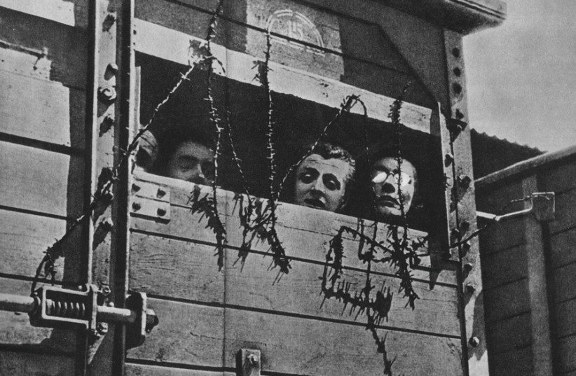 JEWS BEING transported by railway during the Holocaust. (photo credit: Wikimedia Commons)