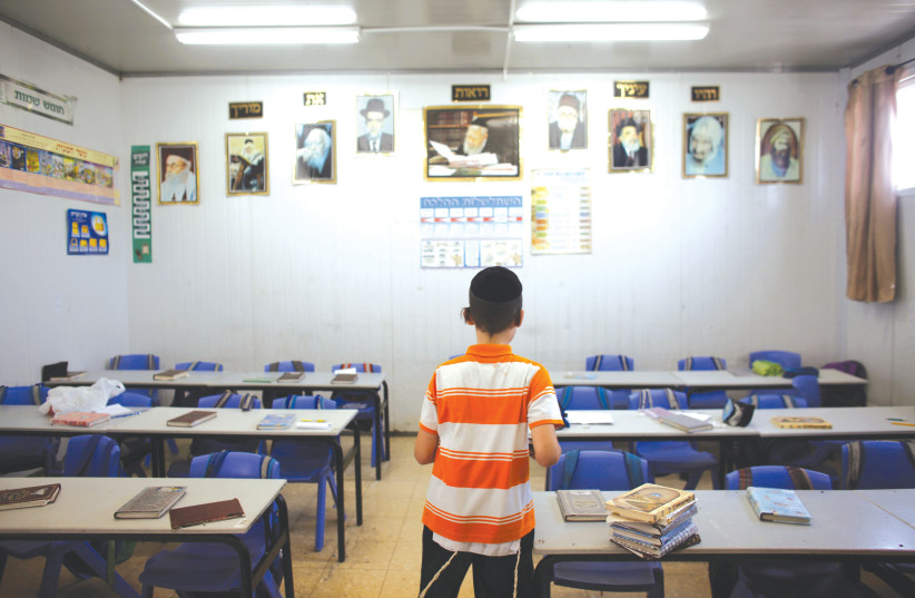 A boy in Moaz Hatorah in Bnei-Brak (photo credit: NIR ELIAS / REUTERS)