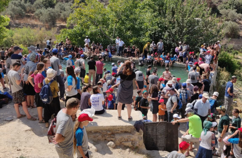 Israelis at the Ein Bubin spring a week after Rina Shnerb was killed in a terror attack (photo credit: TPS)