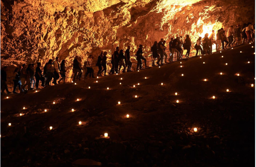 Visitors at Zedekiah’s cave  (photo credit: YAEL HERMAN/PAMI)