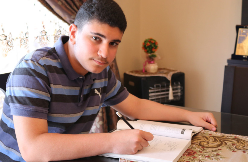 Ismail Ajjawi will be part of Harvard's Class of 2023 (photo credit: ABEER NOUF/UNRWA)