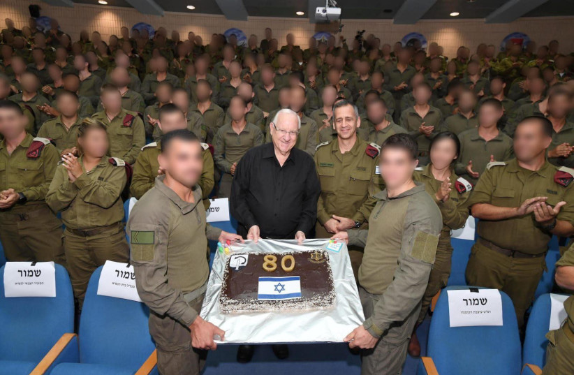 President Rivlin receives a birthday cake from the IDF Commando Brigade, Sepember 9 2019 (photo credit: MARK NEIMAN - GPO)