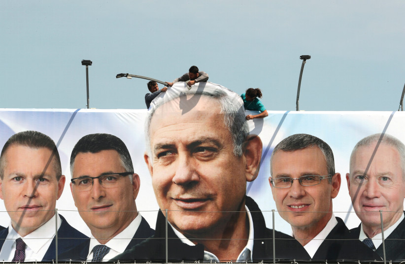 An election ad with Prime Minister Benjamin Netanyahu at the center   (photo credit: REUTERS)