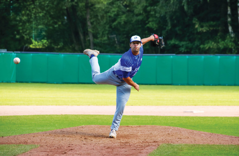  ISRAEL PITCHER Benjamin Wanger pitched a gutsy seventh inning yesterday and struck out the side in the eighth as the blue-and-white beat Great Britain 7-4 to improve its record to a perfect 4-0 at the European Baseball Championship in Germany.  (photo credit: MARGO SUGARMAN)