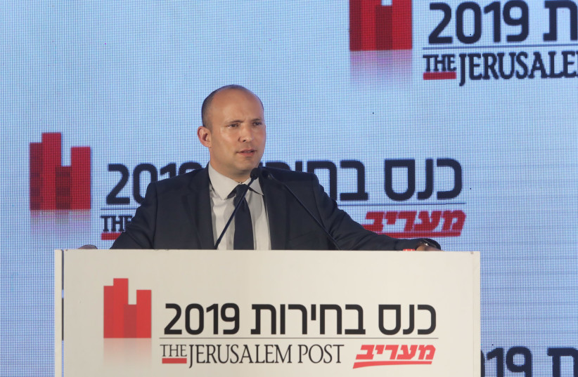 Yamina Knesset candidate Naftali Bennett speaks at the The Jerusalem Post-Ma'ariv Elections Conference, September 11 2019  (photo credit: MARC ISRAEL SELLEM)