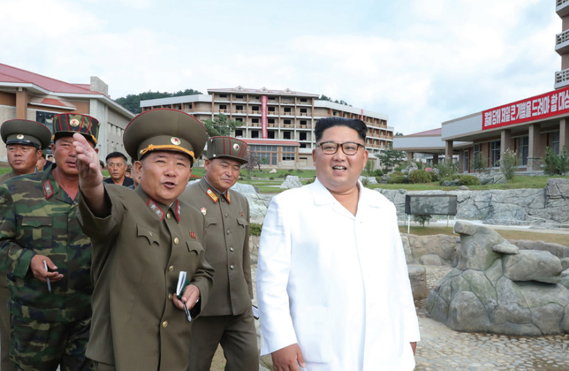 NORTH KOREAN leader Kim Jong Un visits the construction site of the Yangdok County Hot Spring Resort in North Korea. (photo credit: KCNA/ REUTERS)