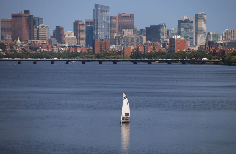 the Charles River in front of the skyline of Boston (photo credit: BRIAN SNYDER/REUTERS)