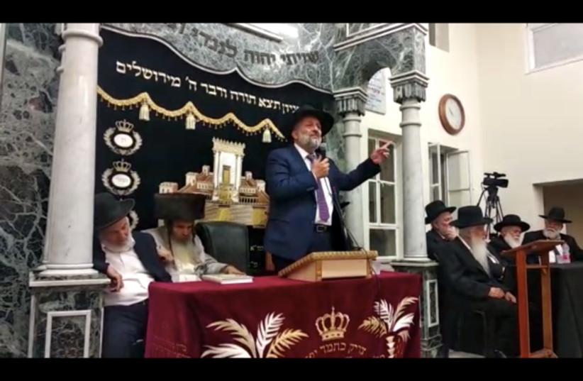  Shas chairman and Interior Minister Aryeh Deri speaking Saturday night at a political rally in the Yazd synagogue in Jerusalem. (photo credit: SHAS)