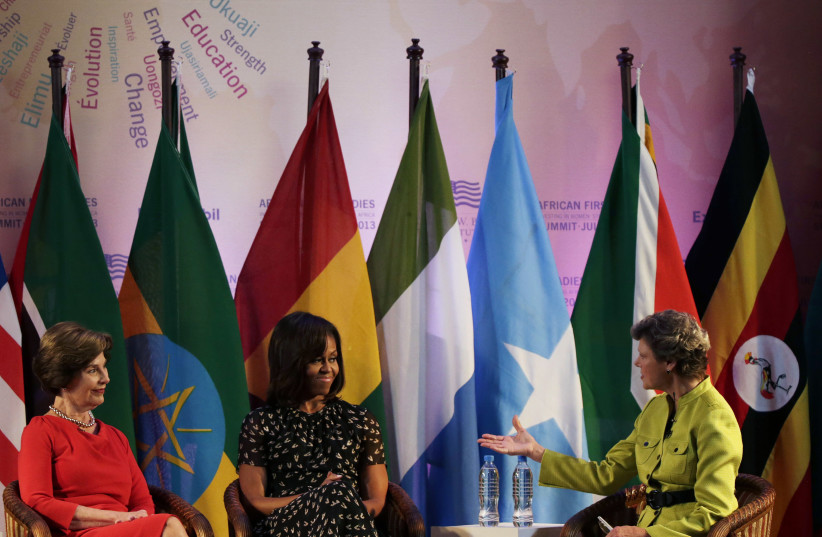 Former U.S. First Lady Laura Bush (L) sits next to current U.S. First Lady Michelle Obama (C) and moderator Cokie Roberts (R) at the African First Ladies Summit in Dar Es Salaam July 2, 2013 (photo credit: REUTERS/GARY CAMERON)