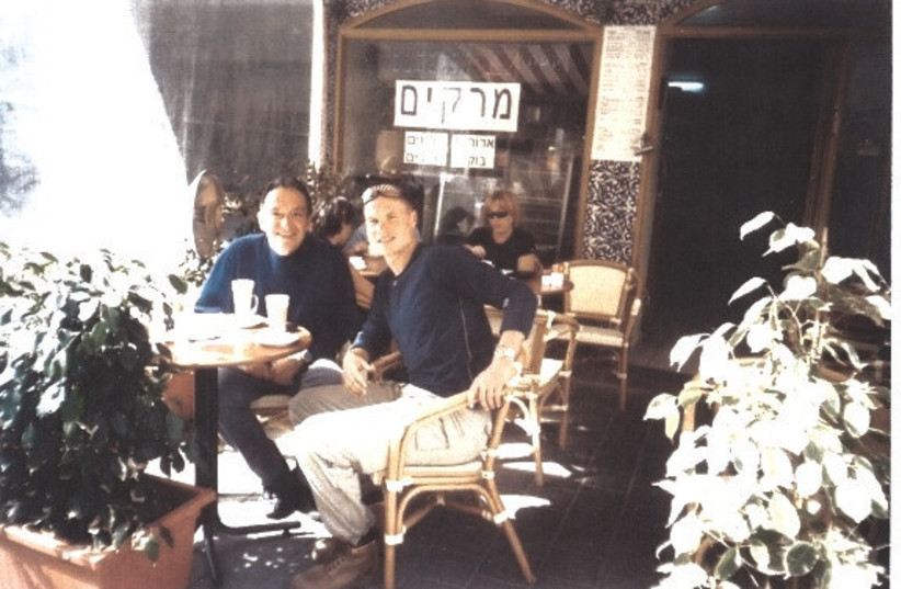 ANDRZEJ KUBICA (right) and the author, agent Don Barnett, sit together at a cafe in Tel Aviv in 2003 (photo credit: DON BARNETT)