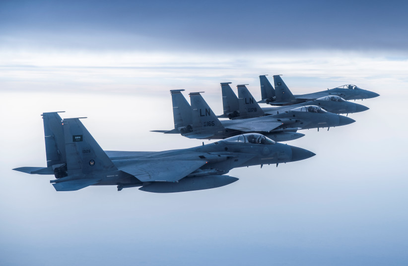 Royal Saudi Air Force F-15's fly with US Air Force F-15's (photo credit: HANDOUT/REUTERS)