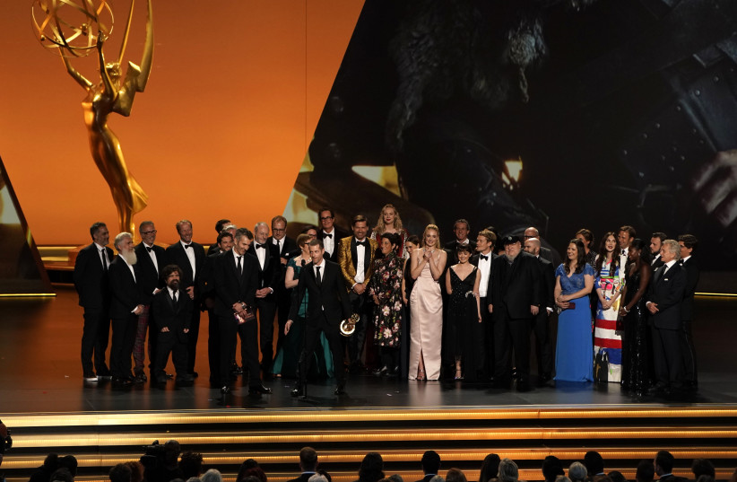 The cast of "Game of Thrones" accepts the Emmy for Outstanding Drama Series. (photo credit: REUTERS)