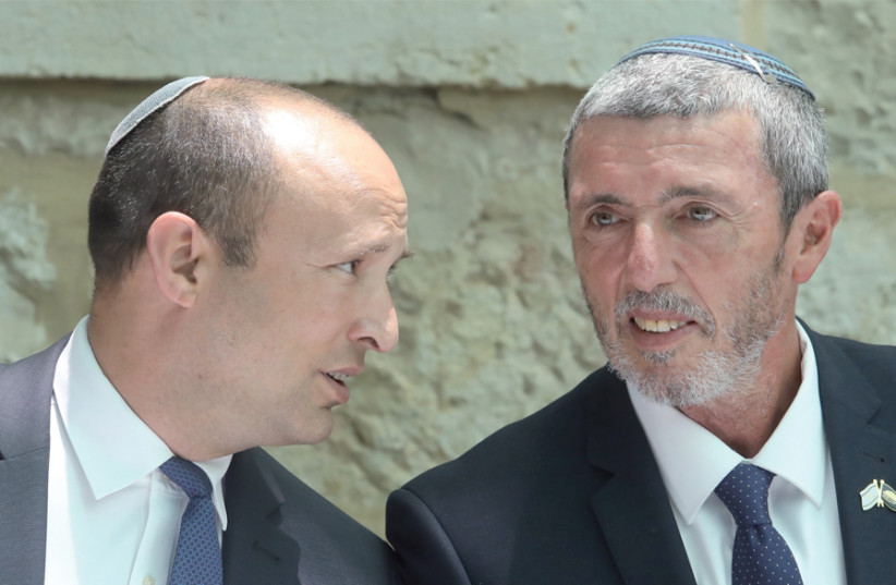Rabbi Rafi Peretz (right) takes over as interim education minister from Naftali Bennett (left) in May (photo credit: MARC ISRAEL SELLEM)