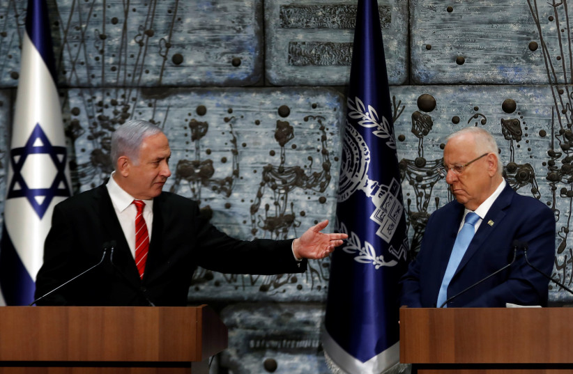 Israeli President Reuven Rivlin and Prime Minister Benjamin Netanyahu attend a nomination ceremony at the President's residency in Jerusalem September 25, 2019 (photo credit: REUTERS)