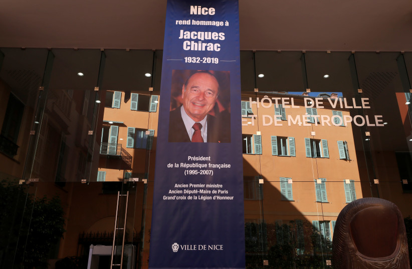 A banner to pay tribute to former French President Jacques Chirac is seen in front of the city hall in Nice (photo credit: REUTERS/ERIC GAILLARD)