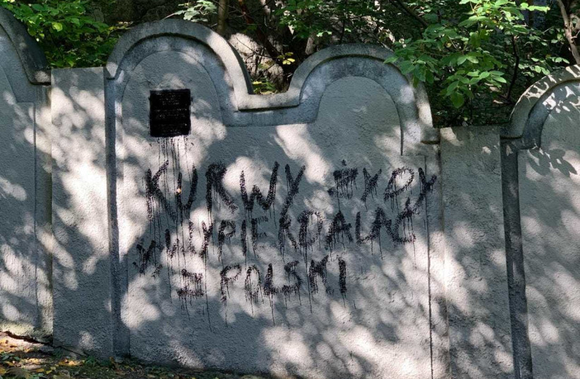 Antisemitic graffiti smeared on remaining wall from the Jewish ghetto built by the Nazis in occupied Krakow, it was quickly cleaned up by the city authorities.     (photo credit: Courtesy)