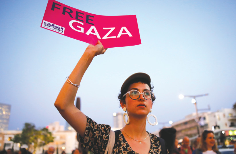 A protester against Eurovision 2019 being held in Israel  (photo credit: CORINNA KERN/REUTERS)