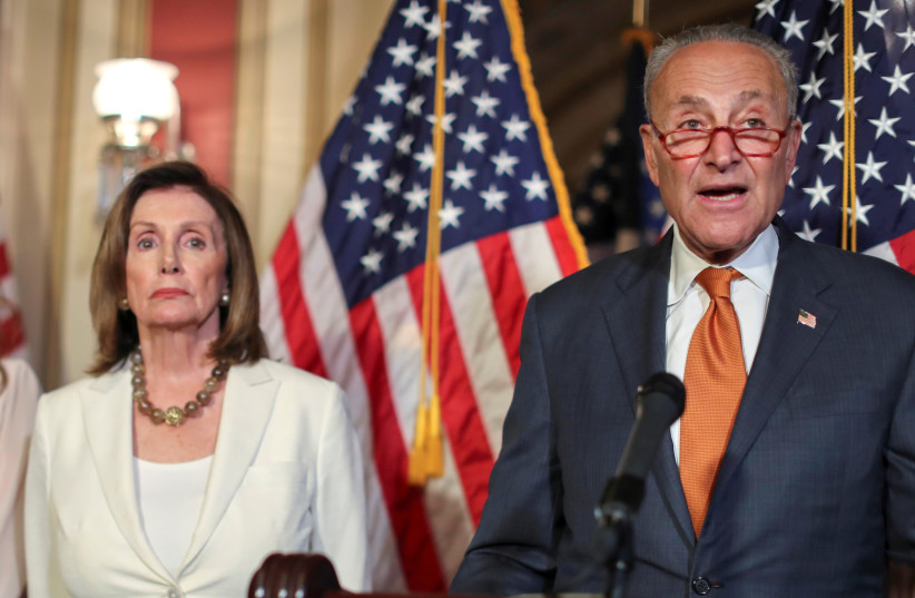 U.S. House Speaker Nancy Pelosi (D-CA) and Senate Minority Leader Chuck Schumer (D-NY) hold a news conference with fellow congressional Democrats to demand that the U.S. Senate vote on the House-passed ''Bipartisan Background Checks Act'' passed by the House of Representatives at the U.S. Capitol in W (credit: REUTERS/JONATHAN ERNST)