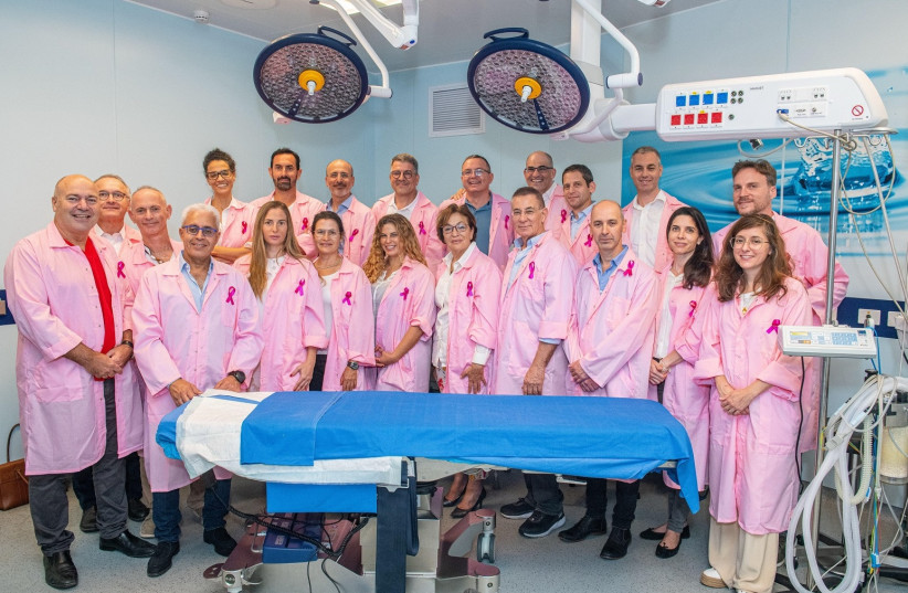 Israeli Society of Plastic & Aesthetic Surgery wear pink for Breast Cancer Awareness Month (photo credit: ISRAEL HADARI)