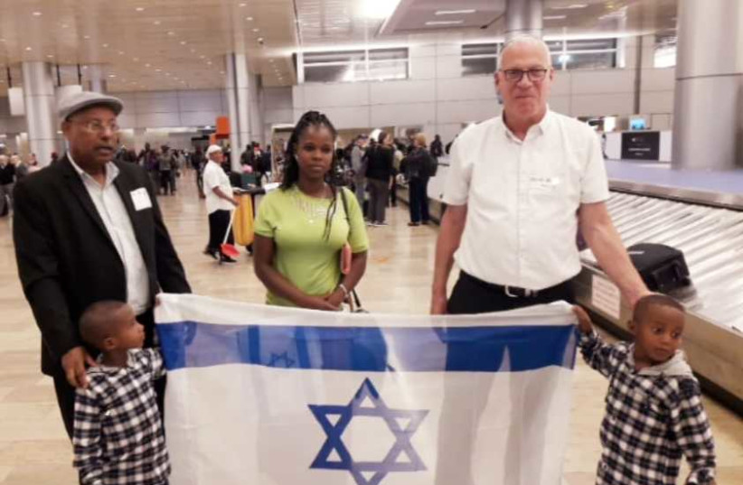 Solomon Tekah's sister lands in Israel with her children, with Minister Uri Ariel (photo credit: Courtesy)