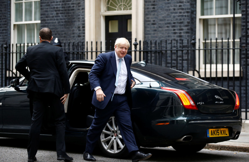 Britain's Prime Minister Boris Johnson arrives at Downing Street in London, Britain, October 3, 2019 (photo credit: REUTERS/HENRY NICHOLLS)