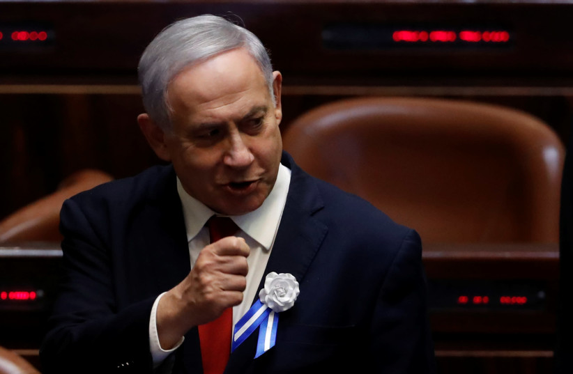 Israeli Prime Minister Benjamin Netanyahu attends the swearing-in ceremony of the 22nd Knesset, the Israeli parliament, in Jerusalem October 3, 2019 (photo credit: RONEN ZVULUN/REUTERS)