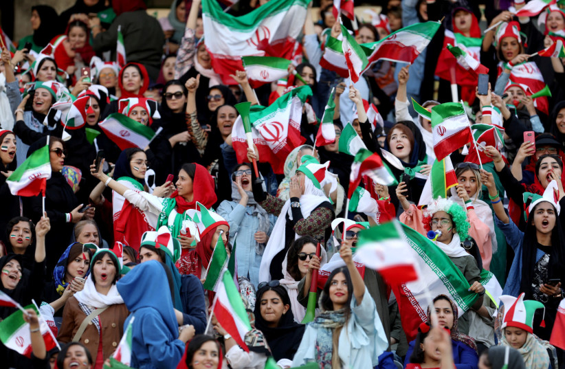 Iranian women fans arrive to attend Iran’s FIFA World Cup Asian qualifier match against Cambodia (photo credit: REUTERS)
