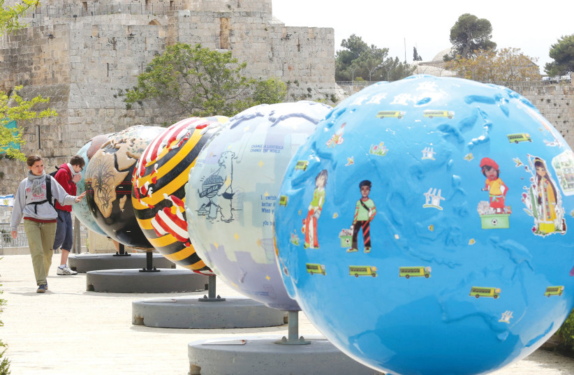 Some of the 'Cool Globes' on display near Jerusalem's O;d City in 2013 to raise awareness of climate change.  (photo credit: MARC ISRAEL SELLEM)