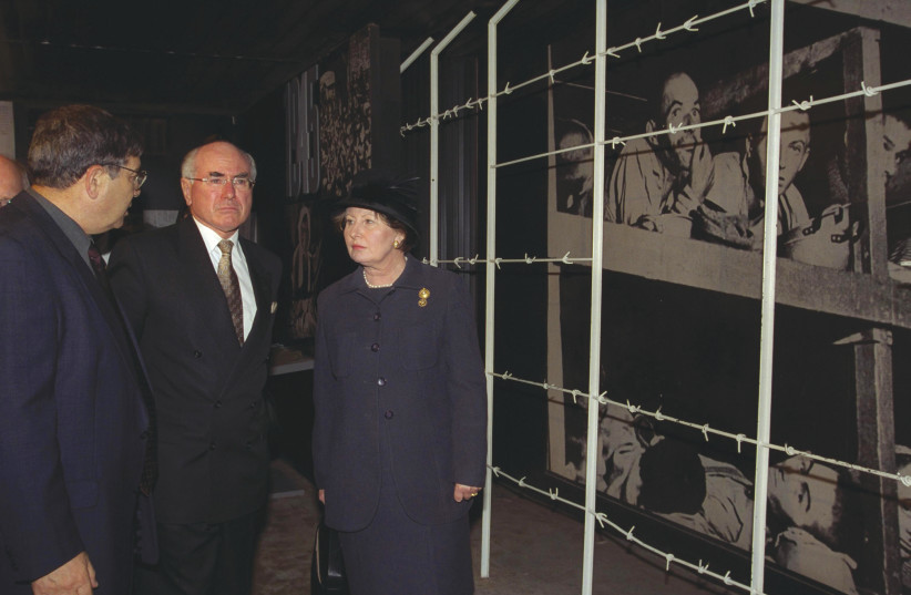 John Howard and his wife Janette visit Yad Vashem on his first official trip to Israel as Australian prime minister in April 2000.  (photo credit: MOSHE MILNER / GPO)