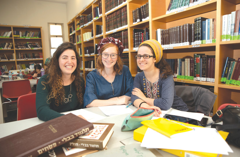 STUDENTS LEARN together in the Matan Beit Midrash (photo credit: Courtesy)