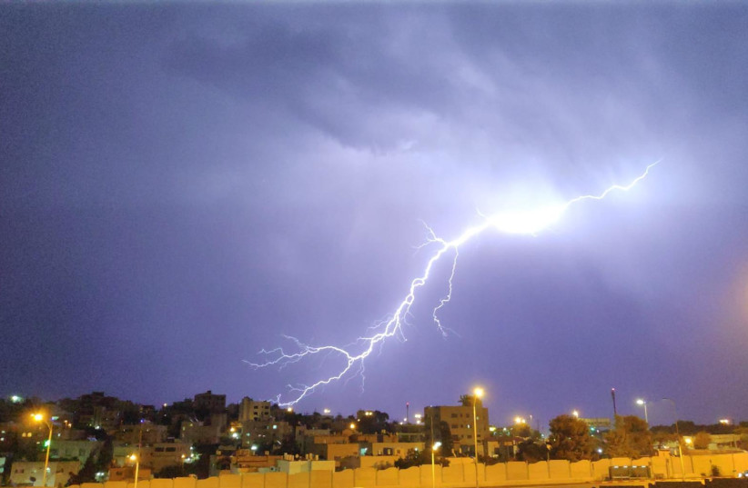Lightning strikes over the Beit Safafa neighborhood in Jerusalem, Oct. 14, 2019 (photo credit: YOSSI ZE'EVI)