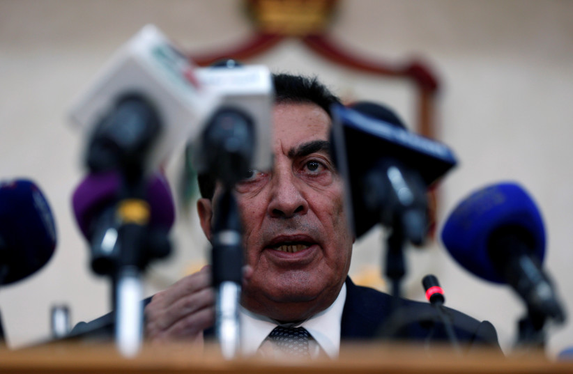 Atef Tarawneh, speaker of the Jordanian parliament, speaks during an emergency meeting to discuss a potential announcement by the US (photo credit: MUHAMMAD HAMED/REUTERS)