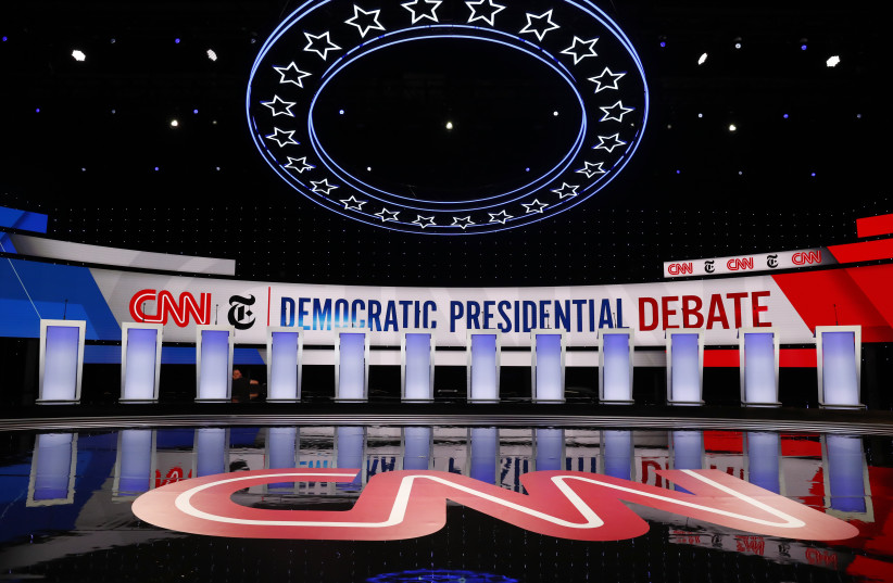 The 12 candidates' podiums stand ready before the fourth U.S. Democratic presidential candidates 2020 election debate at Otterbein University in Westerville, Ohio U.S. October 15, 2019.  (photo credit: JIM BOURG/ REUTERS)
