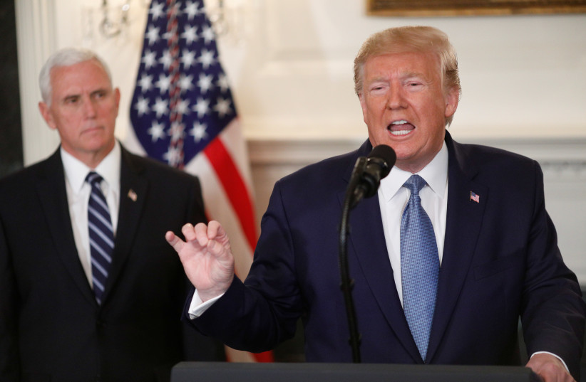 U.S. President Donald Trump delivers a statement on the conflict in Syria with Vice President Mike Pence at his side in the Diplomatic Room of the White House in Washington, U.S., October 23, 2019 (credit: REUTERS//TOM BRENNER)