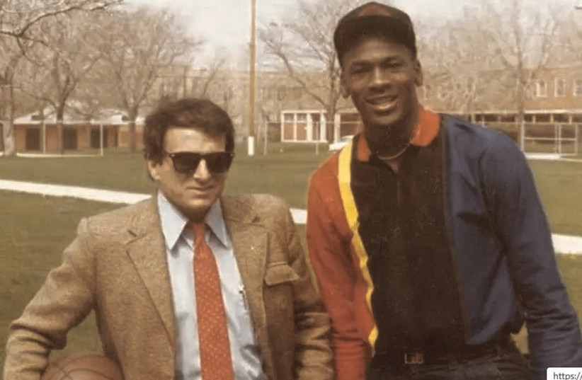 Arik Henig and Michael Jordan pose together in 1984. Henig, the man who put the NBA on the map in Israel, died this week at the age of 72. (photo credit: Courtesy)