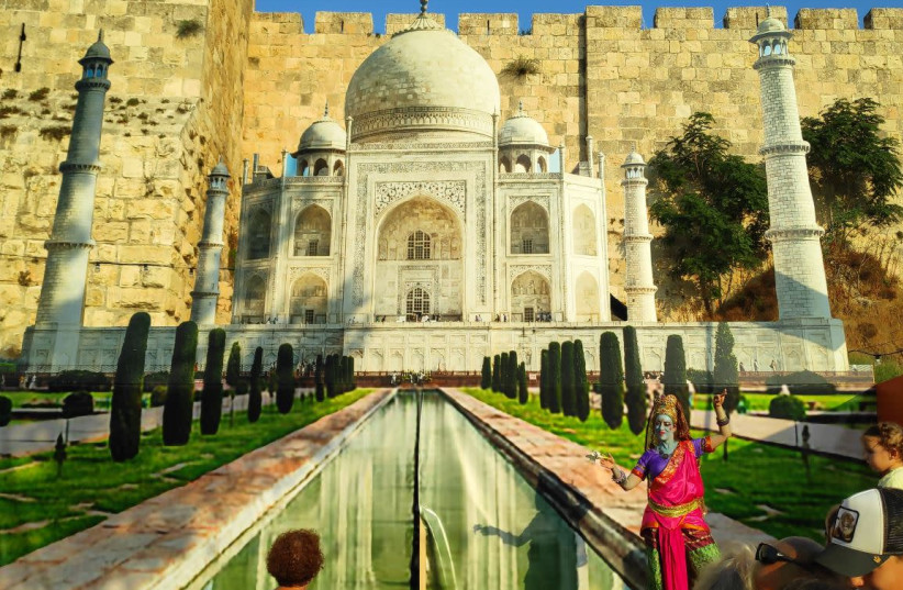 AN ACTRESS in Indian-style costume dances in front of a cardboard Taj Mahal. (photo credit: TZVI JOFFRE)