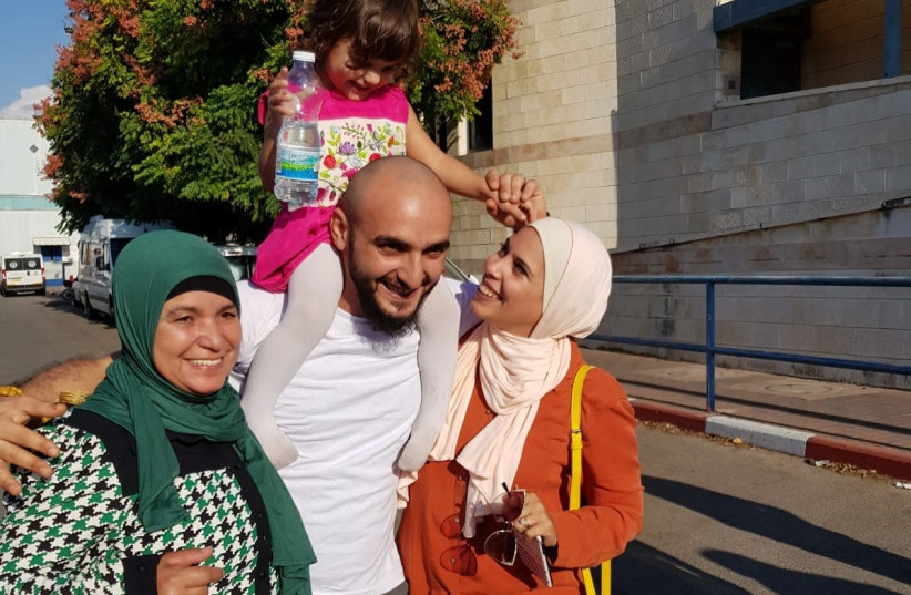 Mustafa and family (photo credit: COURTESY HAMOKED)