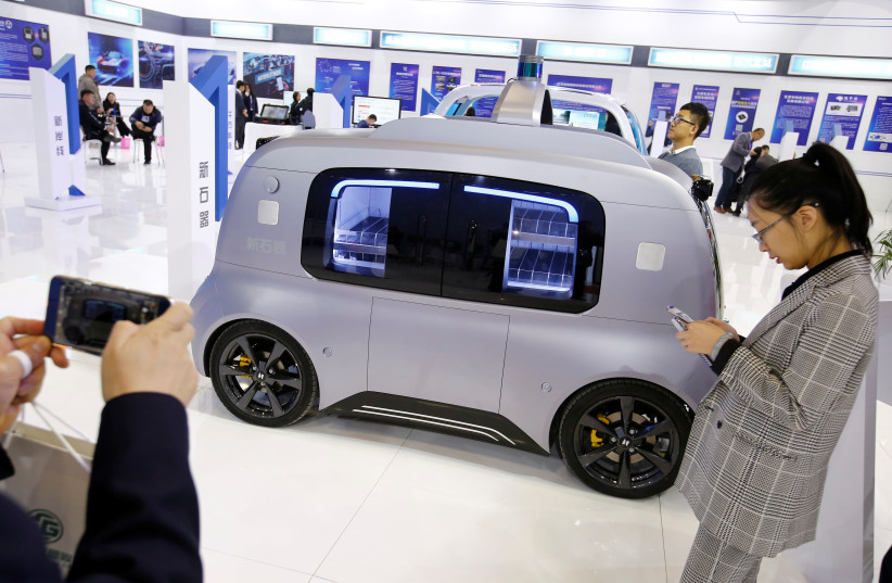 Neolix self-driving vehicle seen at the IEEV New Energy Vehicles Exhibition in Beijing (photo credit: REUTERS)