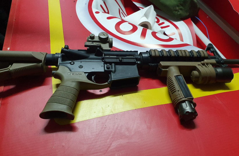 M-16 rifle found during raid in Palestinian town of Abu Dis, Oct. 29, 2019 (photo credit: POLICE SPOKESPERSON'S UNIT)