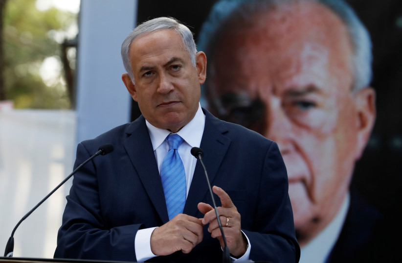 Israel's Prime Minister Benjamin Netanyahu attends a memorial ceremony for the late prime minister Yitzhak Rabin at Mount Herzl military cemetery in Jerusalem as Israel marks the 22nd anniversary of Rabin's killing by an ultra-nationalist Jewish assassin, November 1, 2017 (photo credit: REUTERS/Ronen Zvulun)