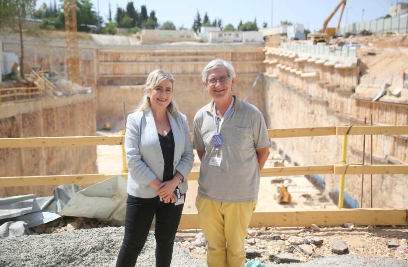 DR. SHANI PALUCH-SHIMON and Prof. Nathan Cherny at the future site of the Shaare Zedek Cancer Center and Radiotherapy Institute.  (photo credit: EZRA LANDAU)