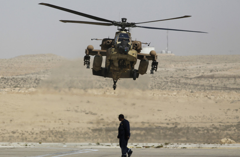 An Israeli Apache helicopter during routine training (photo credit: AMIR COHEN/REUTERS)