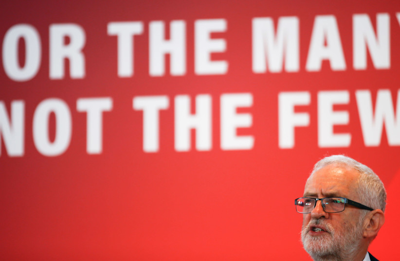 Britain's opposition Labour Party leader Jeremy Corbyn speaks at a launch event for the Labour party's general election campaign in London, Britain October 31, 2019.  (photo credit: REUTERS/HENRY NICHOLLS)