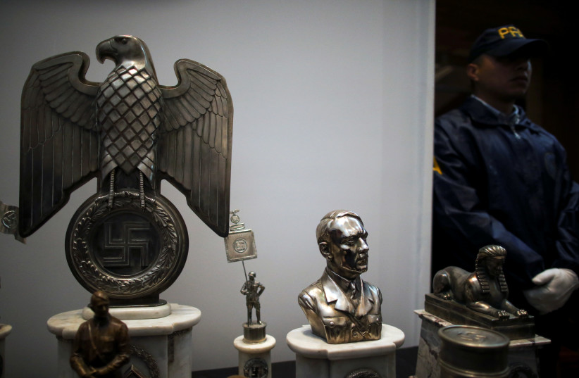 Nazi artifacts at a news conference at the Holocaust museum in Buenos Aires (photo credit: REUTERS/AGUSTIN MARCARIAN)
