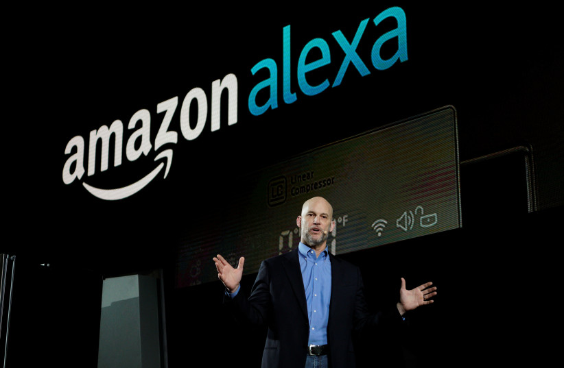 Mike George, VP Alexa, Echo and Appstore for Amazon, speaks during the LG press conference at CES in Las Vegas (photo credit: REUTERS)